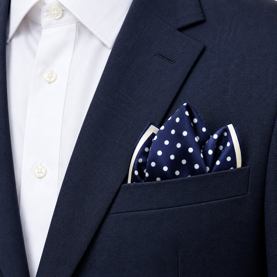 Starry Blue Night Polka Dots pocket square — navy jacket · alternate fold.