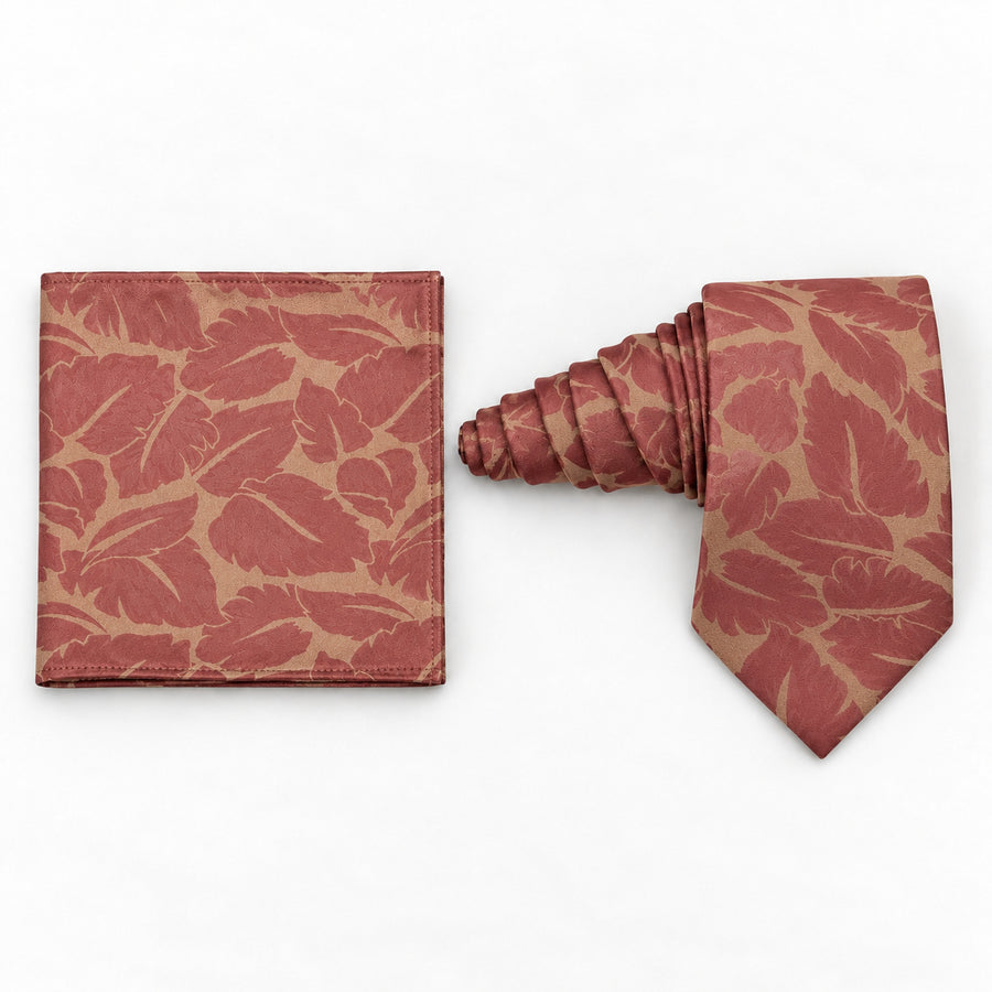 Terracotta Leaf Silhouette silk tie and matching pocket square — Natural coiled pair