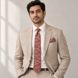 Terracotta Leaf Silhouette silk tie and matching pocket square — Light beige · studio portrait