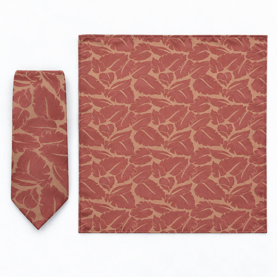 Terracotta Leaf Silhouette silk tie and matching pocket square — Full square · overhead pair