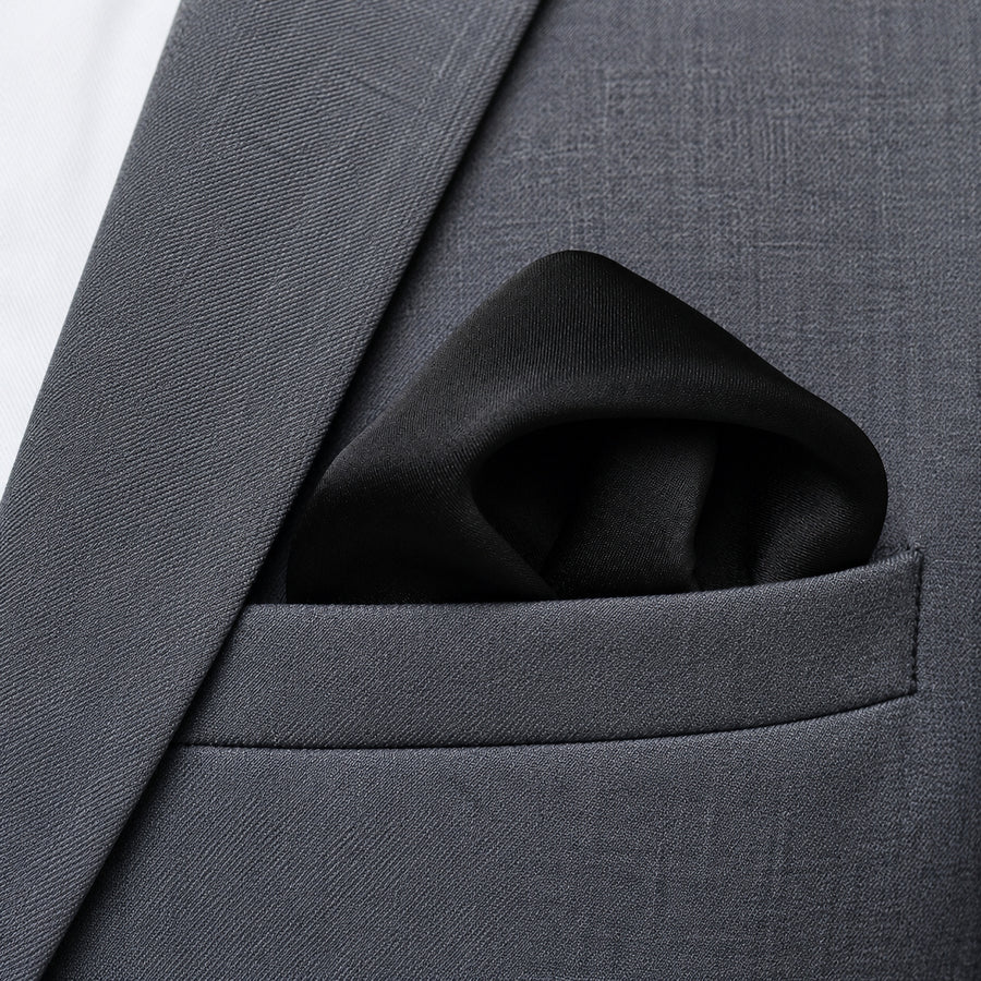 The Black Matter pocket square — close-up wearing detail.