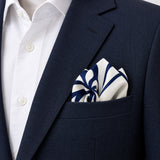 The Blue Chronicles pocket square — navy jacket · alternate fold.