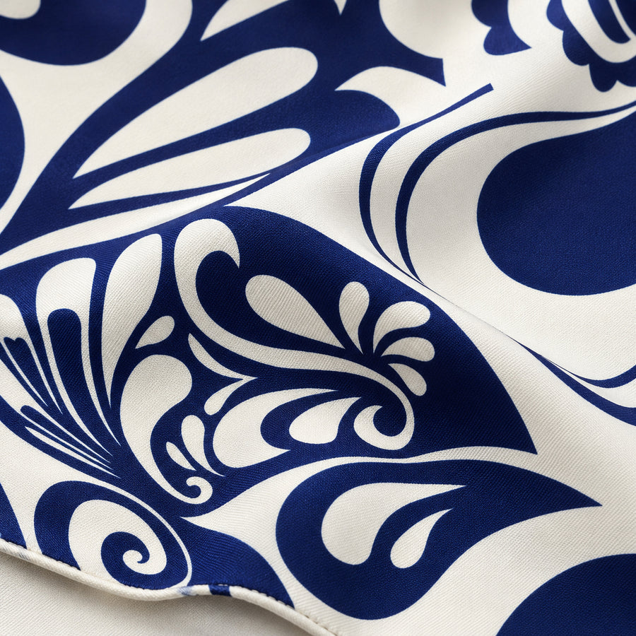The Blue Chronicles pocket square — fabric and design close-up.