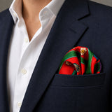 The Fiery Garden pocket square — navy jacket · wearing detail.