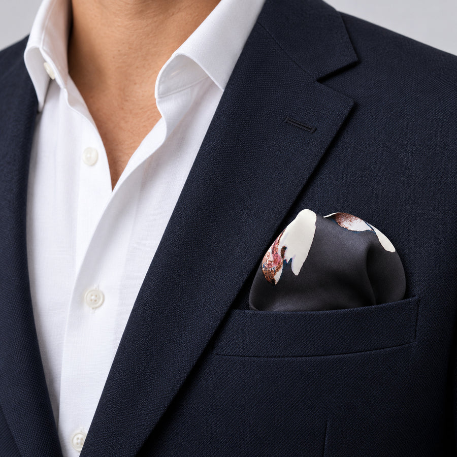 The Grey Garden pocket square — navy jacket · wearing detail.