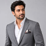 The Grey Garden pocket square — model · light grey and open collar.
