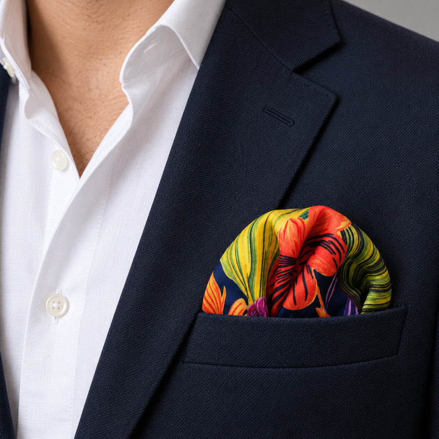 The Mighty Blue Jungle pocket square — navy jacket · wearing detail.