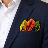 The Mighty Blue Jungle pocket square — navy jacket · alternate fold.