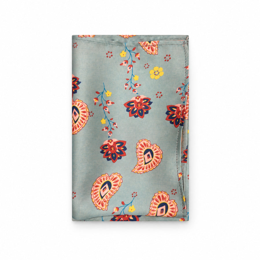 The Paisley Petals pocket square — folded product.