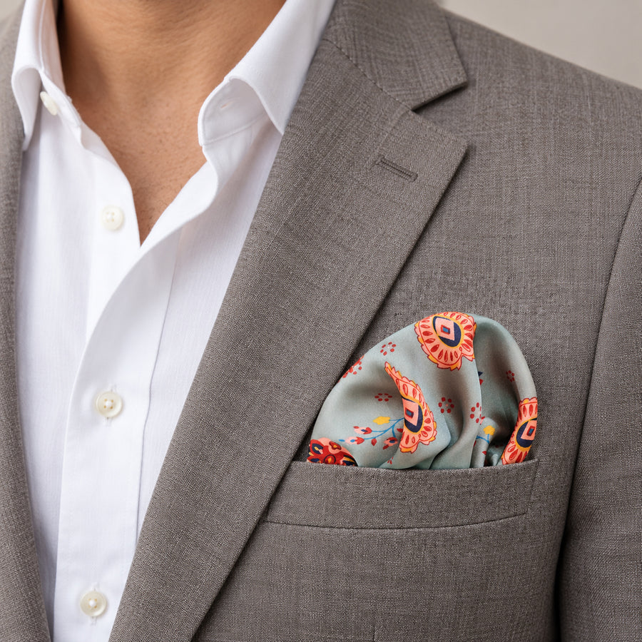 The Paisley Petals pocket square — light jacket · wearing detail.
