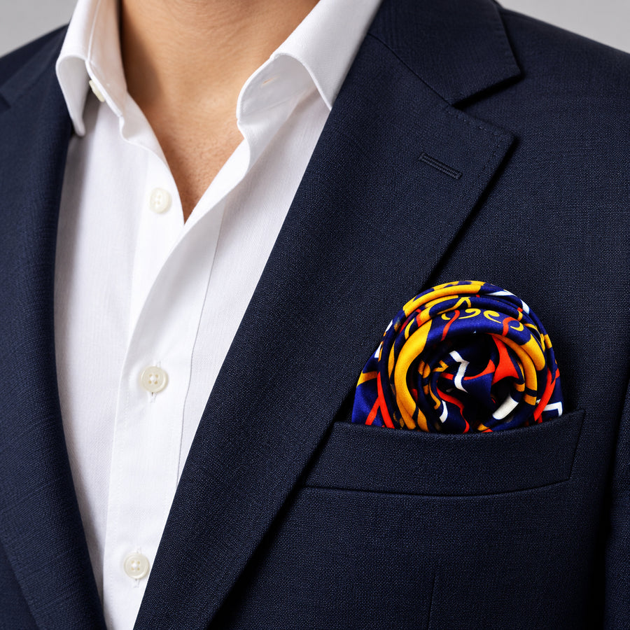 Traditional Ethnic pocket square — navy jacket · wearing detail.