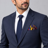 Traditional Ethnic pocket square — formal model · navy and tie.