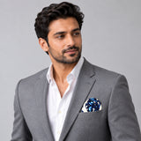 Turkish Floral pocket square — model · light grey and open collar.