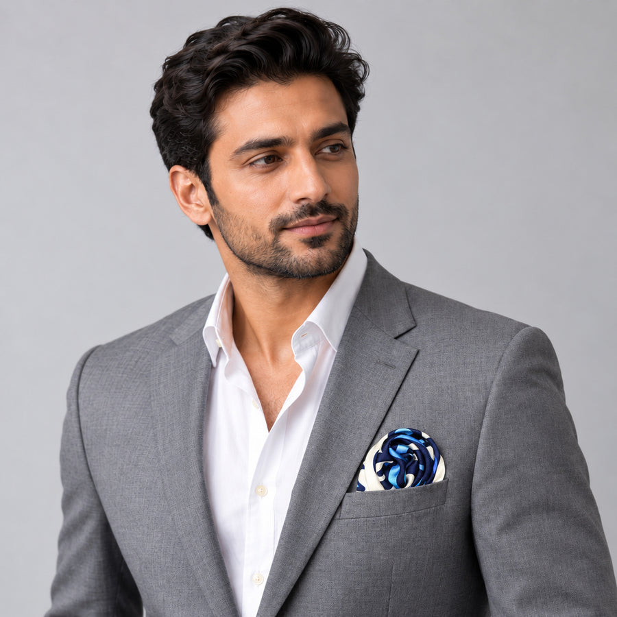 Turkish Floral pocket square — model · light grey and open collar.