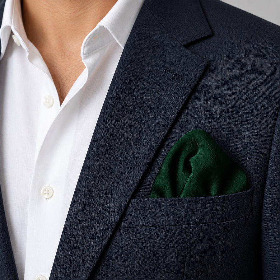 Deep Green pocket square — navy jacket · wearing detail.