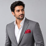 Twinkle Maroon pocket square — model · light grey and open collar.