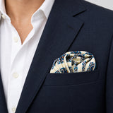 Ukrainian Folk Art pocket square — navy jacket · wearing detail.