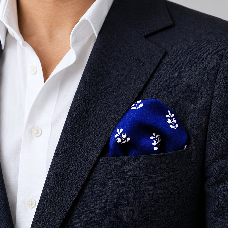 White Conifer pocket square — navy jacket · wearing detail.