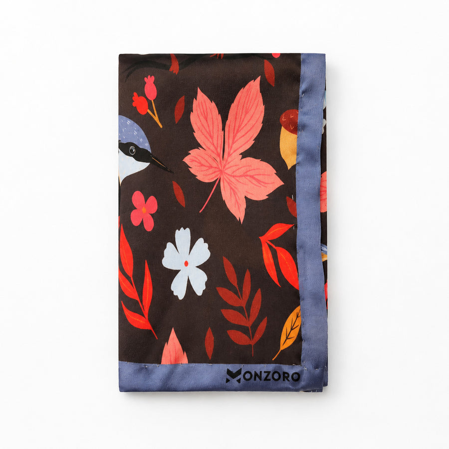 Winter Birds and Autumn Leaves pocket square — folded product.