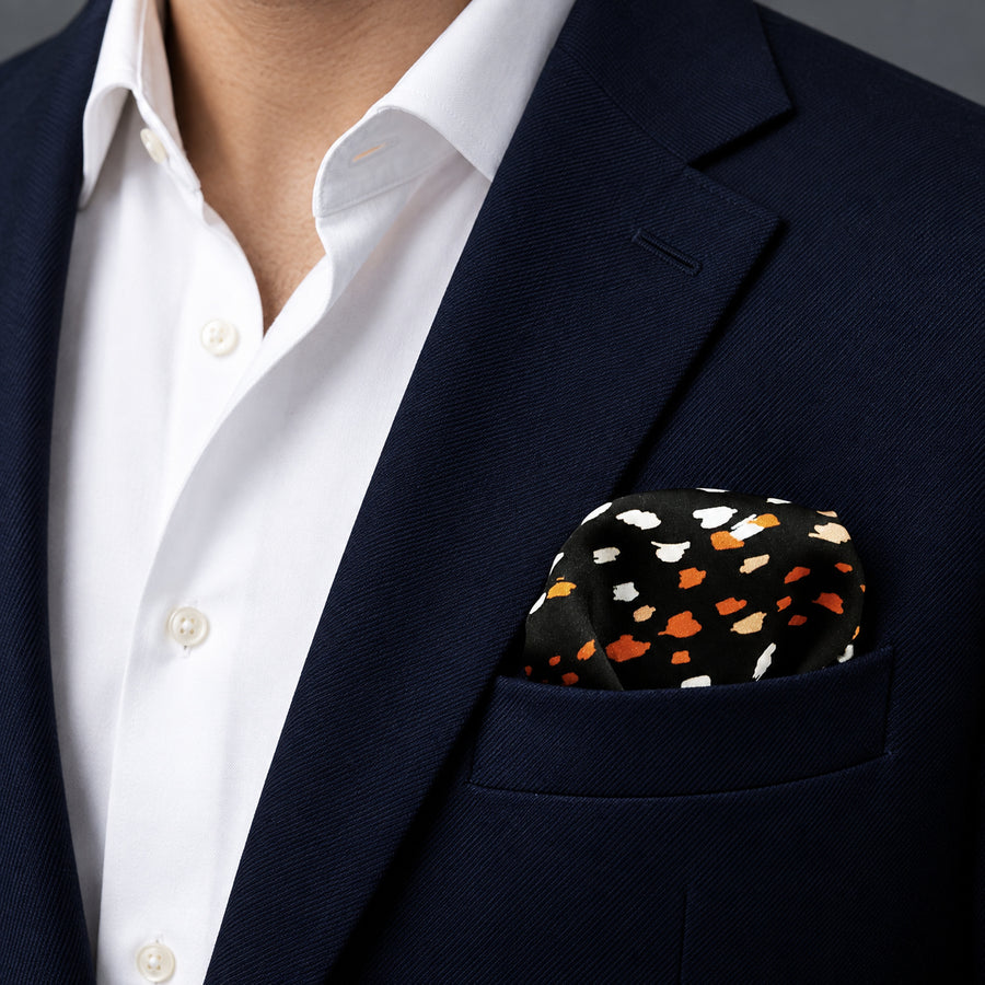Winter Black Pattern pocket square — navy jacket · wearing detail.
