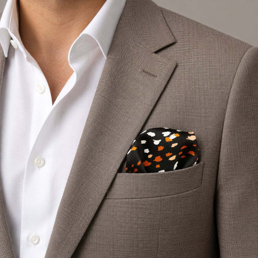 Winter Black Pattern pocket square — light jacket · wearing detail.