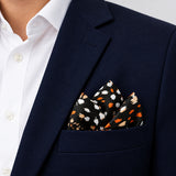 Winter Black Pattern pocket square — navy jacket · alternate fold.