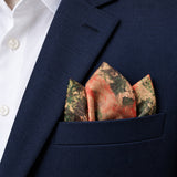 Abstract Floral pocket square — navy jacket · alternate fold.