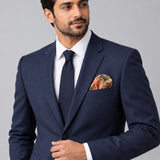 Abstract Floral pocket square — formal model · navy and tie.