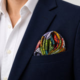 Abstract Matrix pocket square — navy jacket · wearing detail.