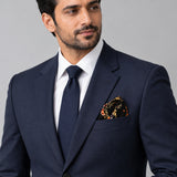 Ball Chain Art pocket square — formal model · navy and tie.