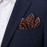 Chocolate HoneyComb pocket square — navy jacket · alternate fold.
