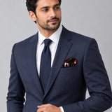 Black Dalmatian pocket square — formal model · navy and tie.
