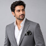 Black & White Abstract pocket square — model · light grey and open collar.
