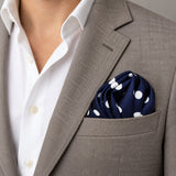 Blue Polka Drops pocket square — light jacket · wearing detail.