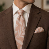 Blush Laurel Leaf silk tie and matching pocket square — Tobacco brown · notch lapel