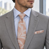 Blush Laurel Leaf silk tie and matching pocket square — Stone grey · pale blue shirt