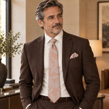 Blush Laurel Leaf silk tie and matching pocket square — Deep brown · relaxed portrait