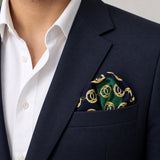 Chain Loop Green pocket square — navy jacket · wearing detail.