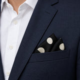 Black and White Jumbo Polka Dots pocket square — navy jacket · alternate fold.