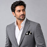 Black and White Jumbo Polka Dots pocket square — model · light grey and open collar.