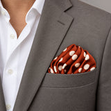 Copper Base Polka Dots pocket square — light jacket · wearing detail.