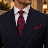Crimson Leaf Silhouette silk tie and matching pocket square — Midnight blue · evening detail