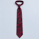 Crimson Leaf Silhouette Silk Tie — Relaxed knotted layout