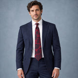Crimson Leaf Silhouette Silk Tie — Navy suit portrait
