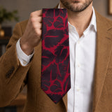 Crimson Leaf Silhouette Silk Tie — Handheld tie blade detail