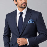 Deep Blue Ocean pocket square — formal model · navy and tie.