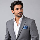 Deep Blue Ocean pocket square — model · light grey and open collar.