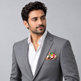 Foulard Pattern pocket square — model · light grey and open collar.