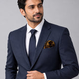 Gold Ornamental pocket square — formal model · navy and tie.