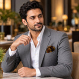 Gold Ornamental pocket square — restaurant lifestyle.